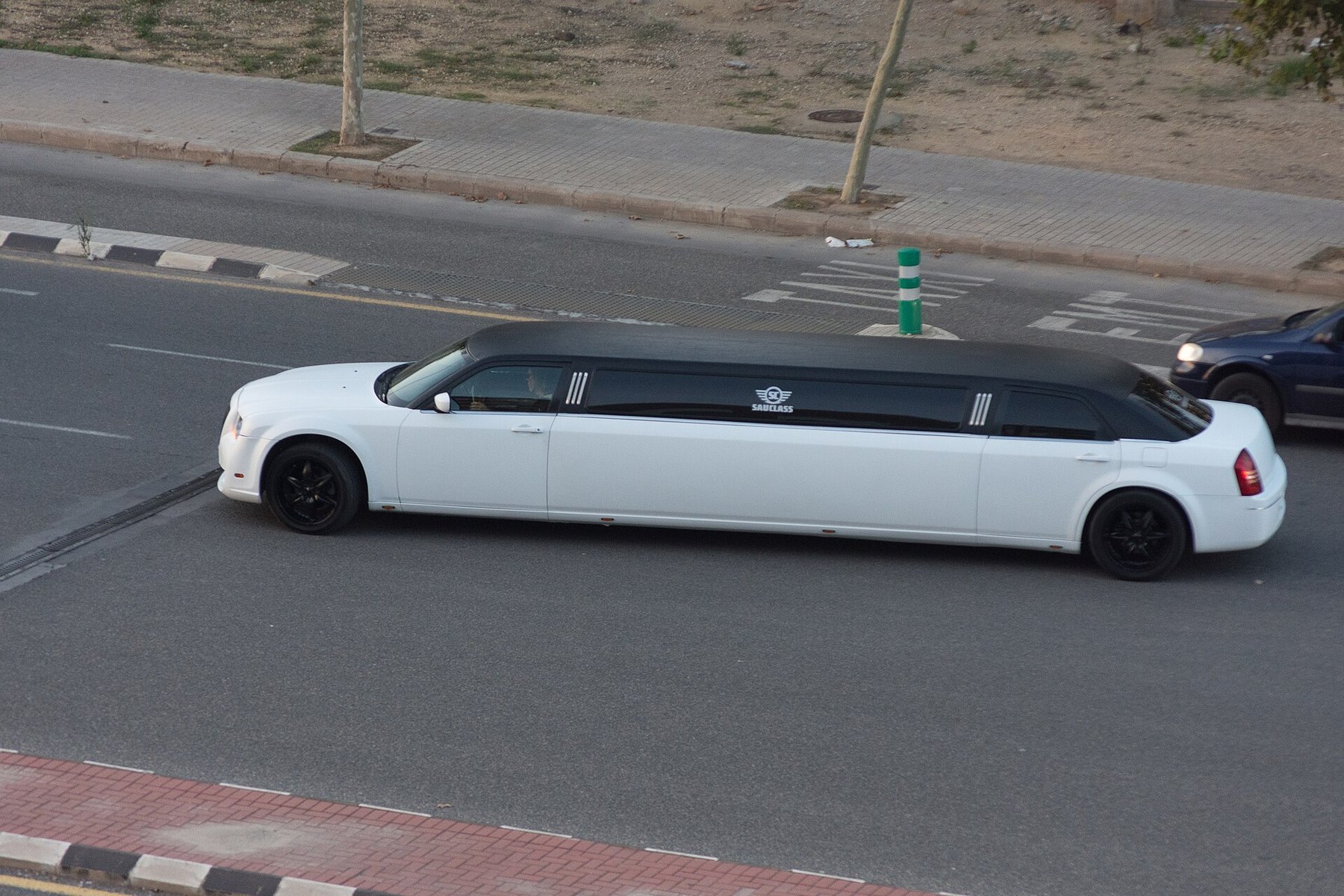 White stretch limousine parked outdoors